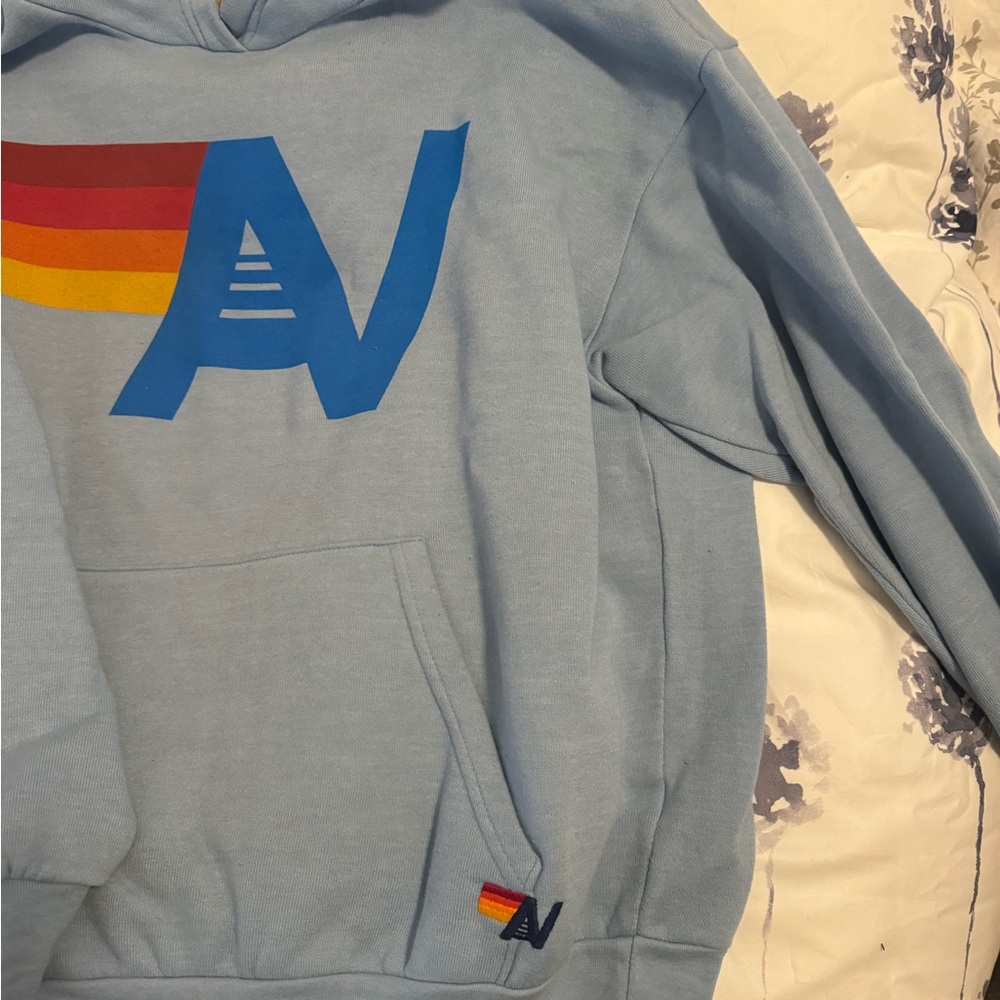 Aviator Nation Light Blue Hoodie with Rainbow Logo